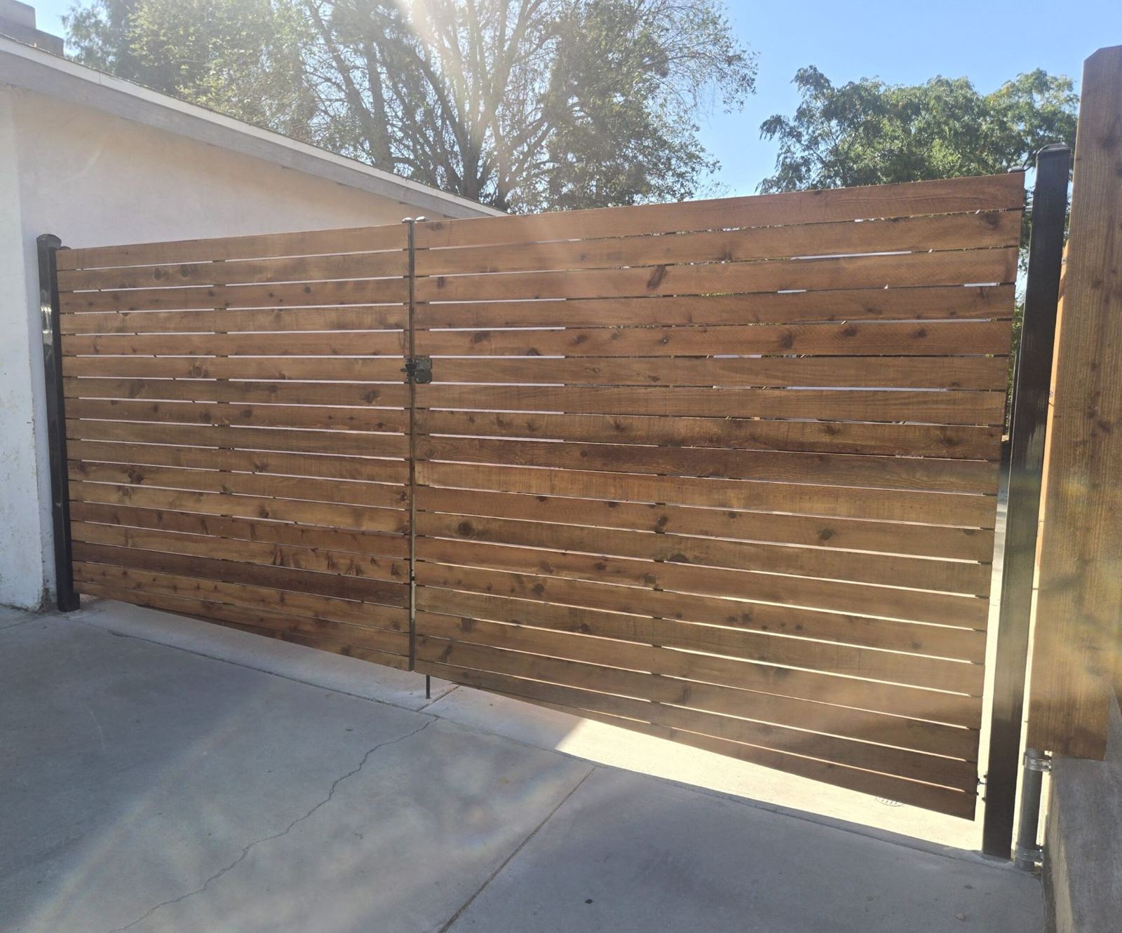 Horizontal wood double driveway gate